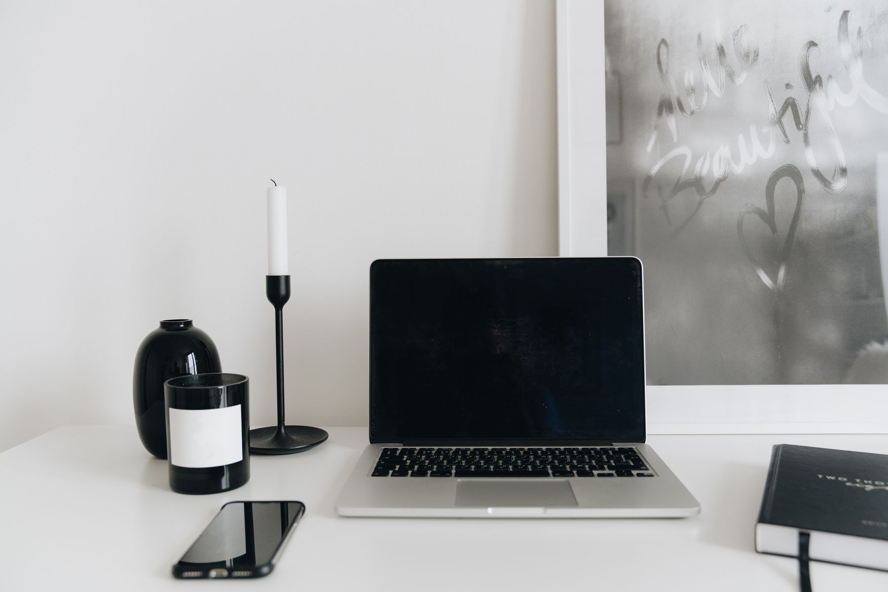 Phone and notebook on a desk